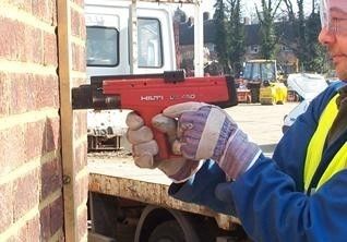 Pistola de clavos sin hilos de grado profesional DX-450 accionada con polvo con fuente de energía manual